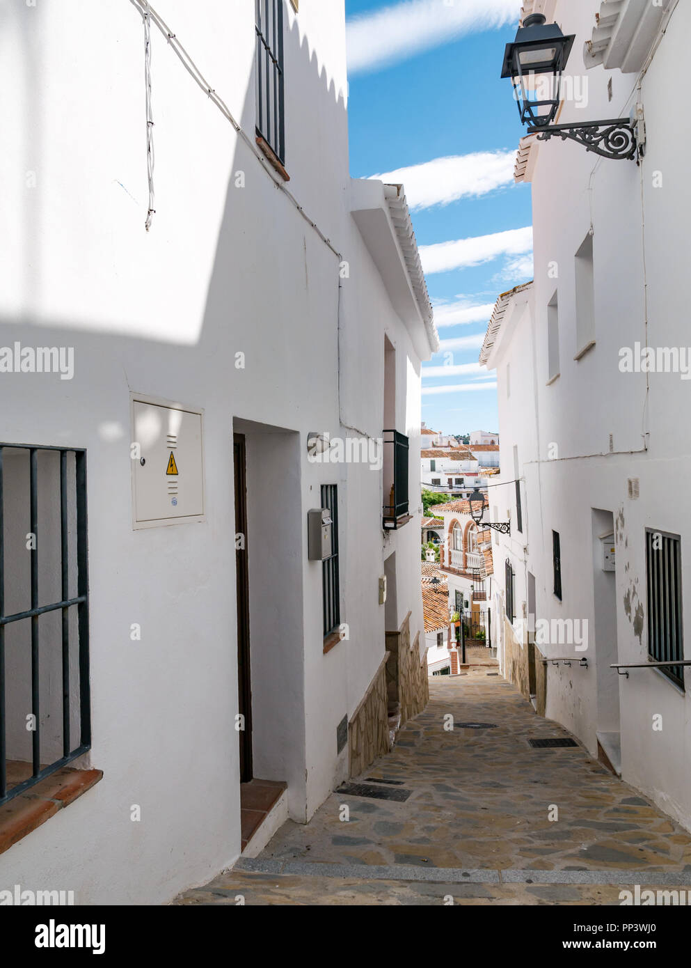 Picturesque narrow lane with traditional white houses, Sedella, Axarquia, Andalusia, Spain Stock Photo
