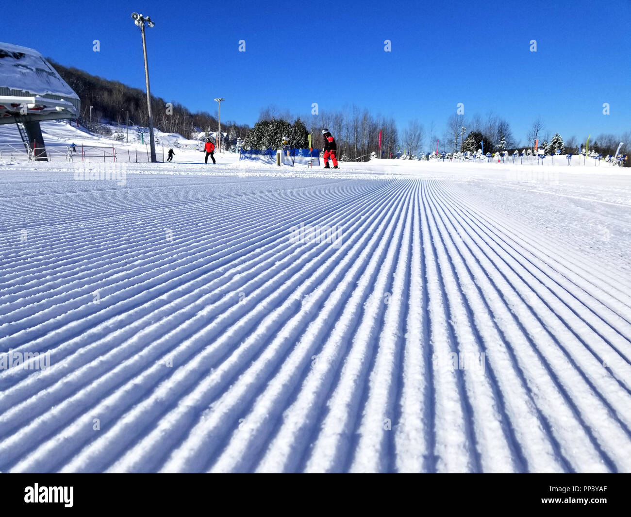 Groomed snow of alpine skiing trails at Saint-Sauveur, Quebec Stock Photo