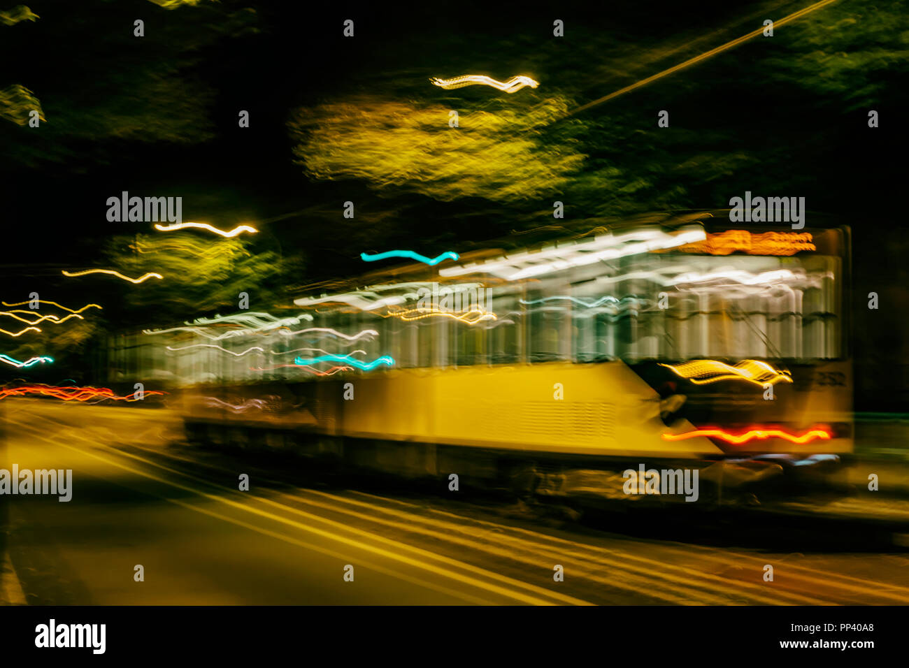 Berlin, Germany, September 10, 2018: Handheld Camera Blurred Motion of Tramway at Night Stock Photo