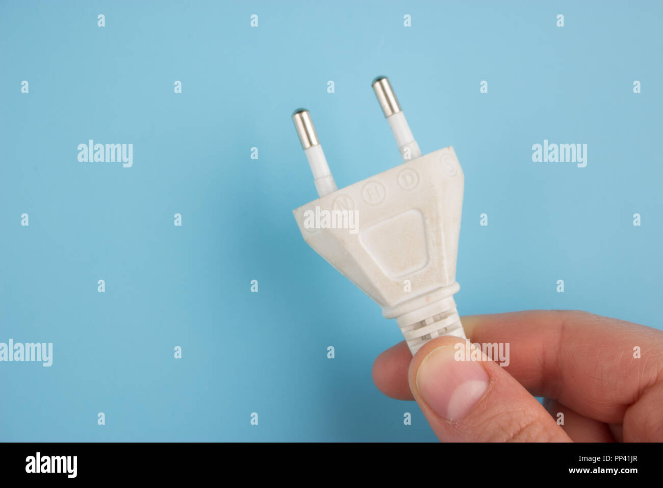 energy saving concept. electrical plug switched off Stock Photo Alamy