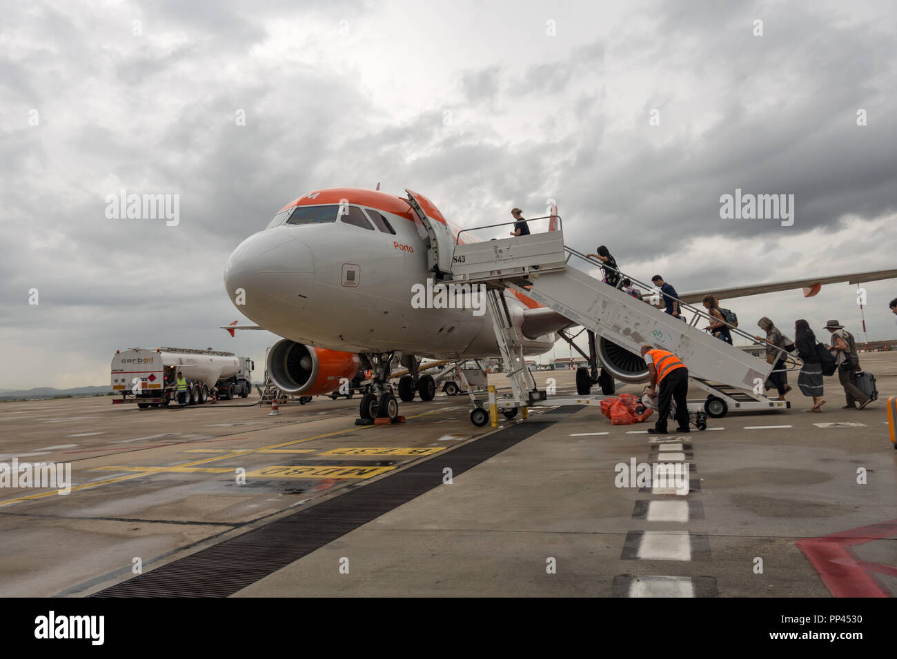 EasyJet aircraft on at loading gate, Cagliari Airport, Sardinia, Italy Stock Photo
