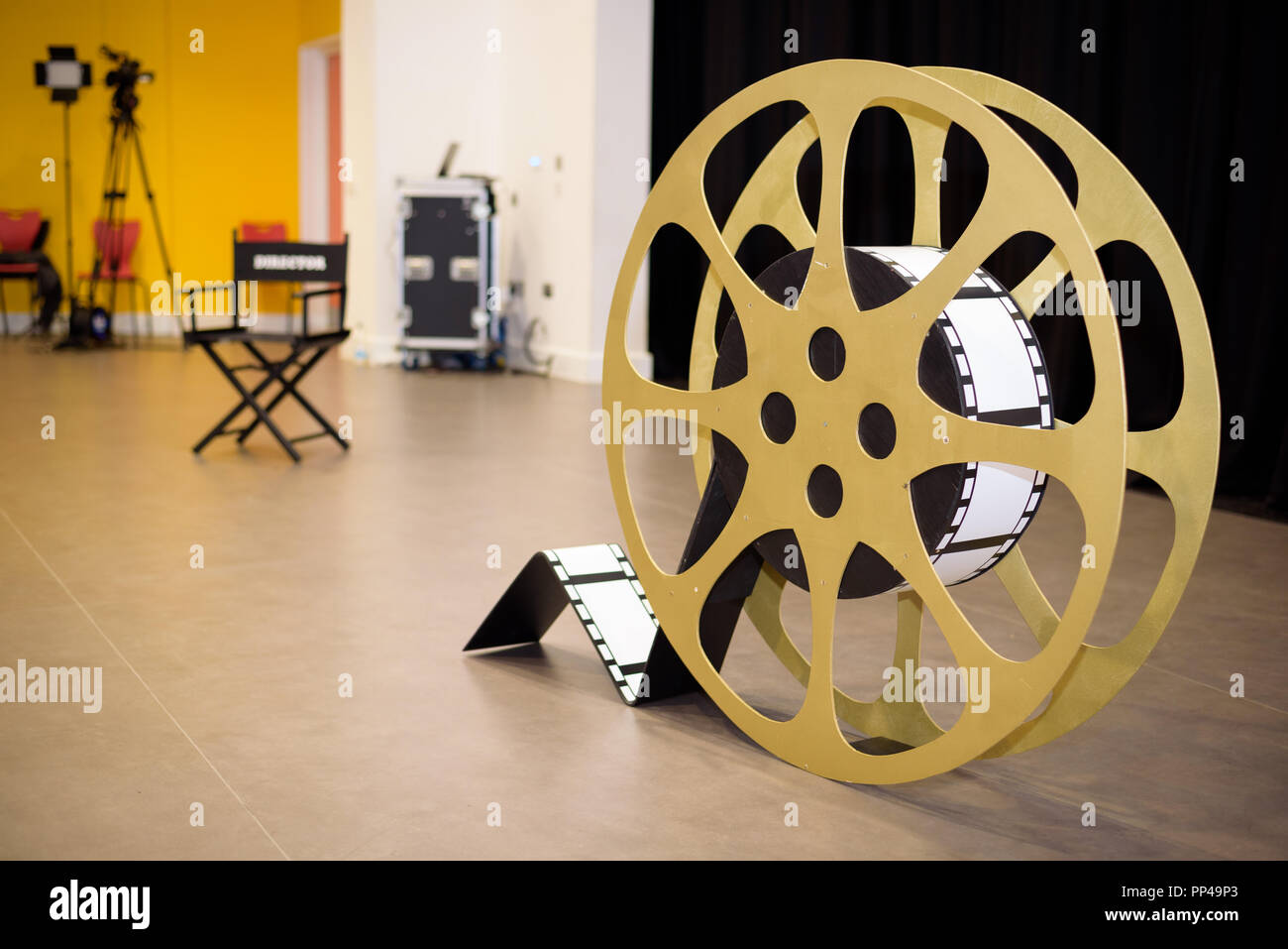 Big Movie Film Reel Prop on a movie Set Stock Photo - Alamy