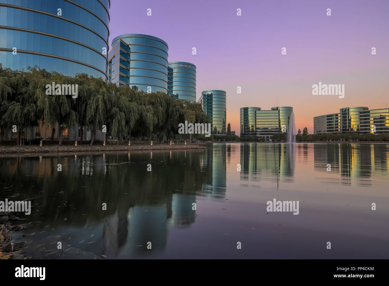 Oracle headquarters and lake with sunset skies Stock Photo