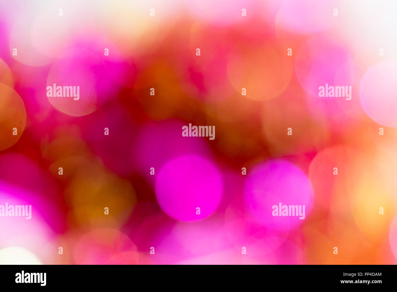 Bright fuchsia bokeh lights. Space for text. Stock Photo