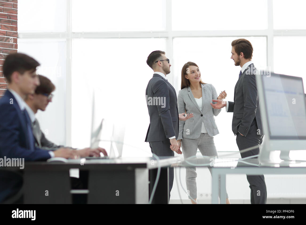 Young business crew working with startup modern office. Stock Photo