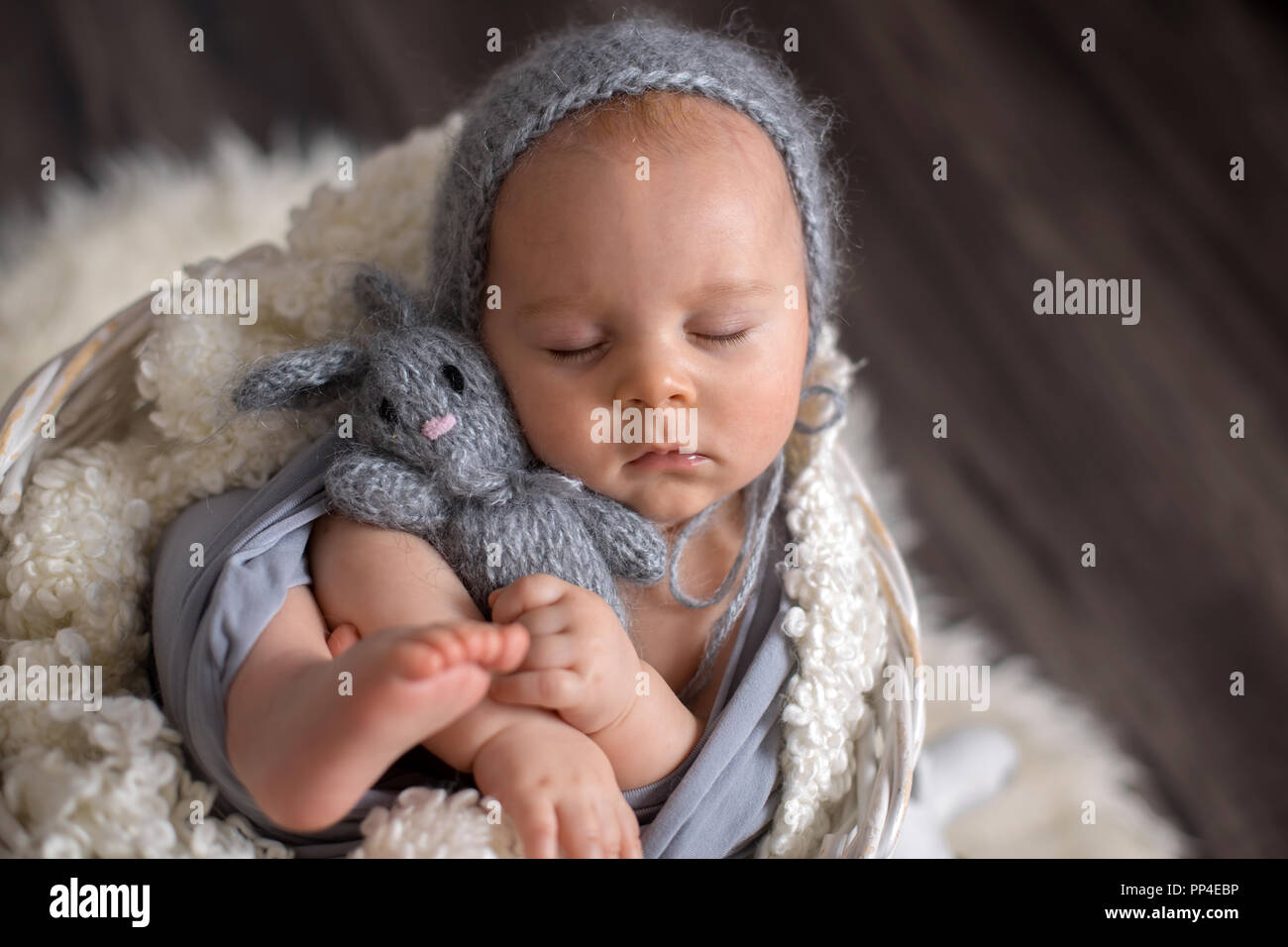 Awake newborn baby boy basket hi res stock photography and images