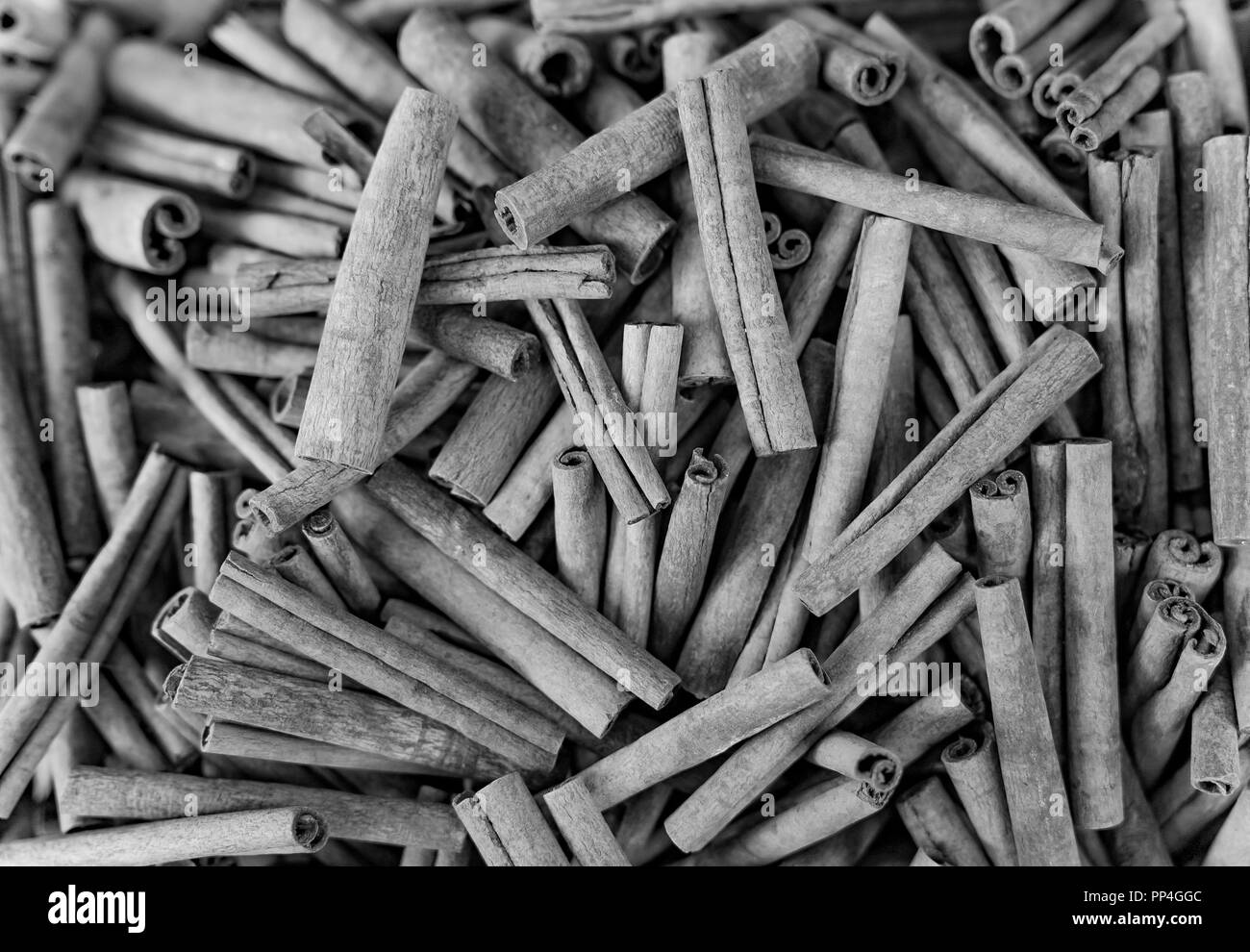 Cinnamon sticks in a bazaar, black and white Stock Photo