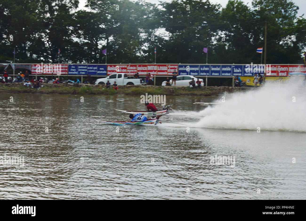 Nakornnayok Thailand September 23, 2018 : speed wooden long tail boat with engine modify racing on Rungsit-Nakornnayok canal in Thailand Stock Photo