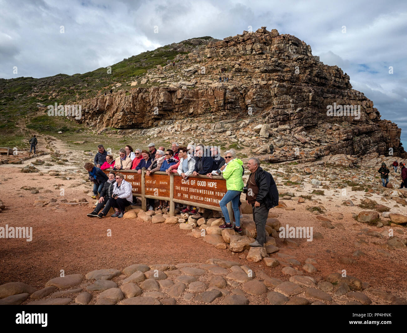 Tourists at the Cape of Good Hope, the south-western point of the African continent, within Cape Point National Park and showing Dias Beach, Western C Stock Photo