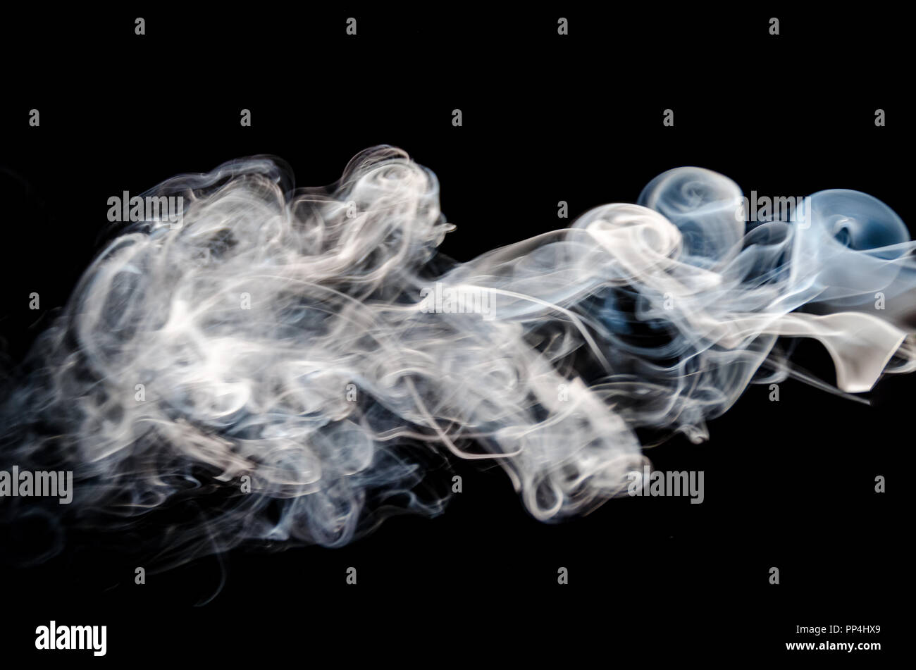 Abstract smoke on a black background Stock Photo - Alamy