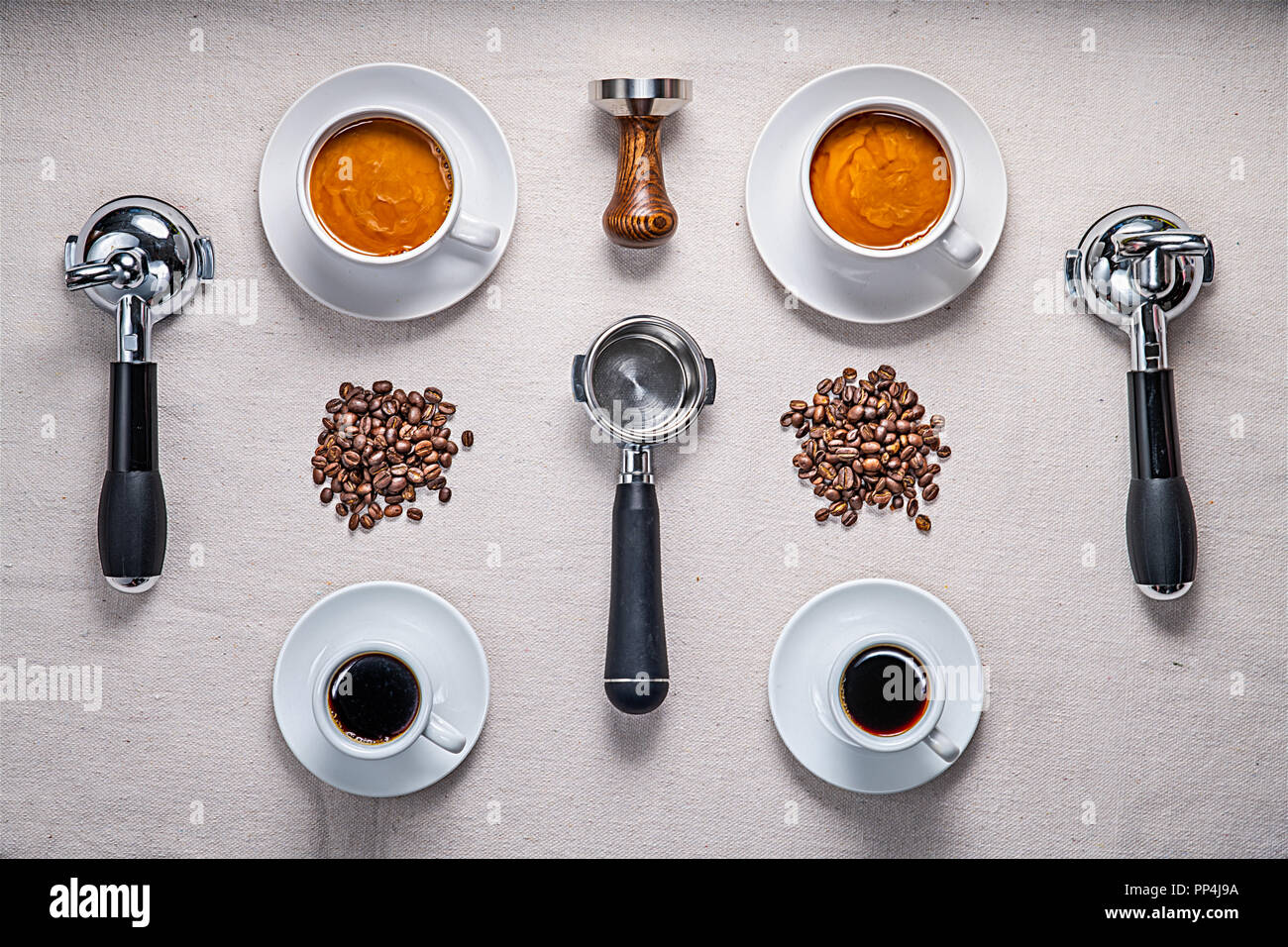 Flat lay photograph of coffee and coffee making equipment, including