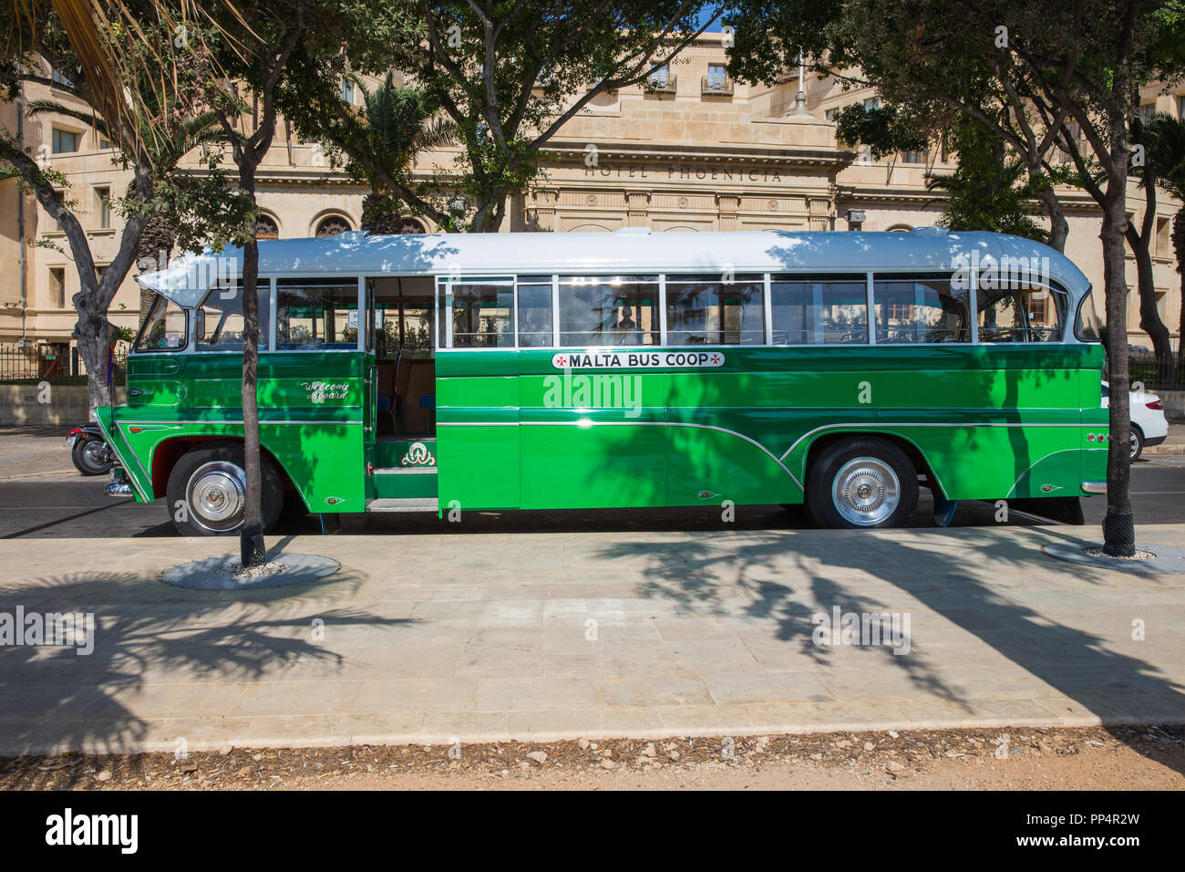 City Valleta, Malta, Europe. City streets and  urban view. Green bus, peoples and architecture. Travel photo 2018 september. Stock Photo