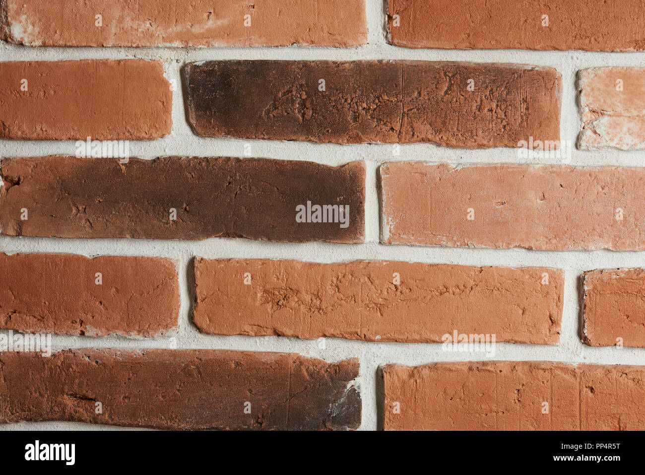 Close-up of red brick wall. Texture of clean new red brick background Stock Photo