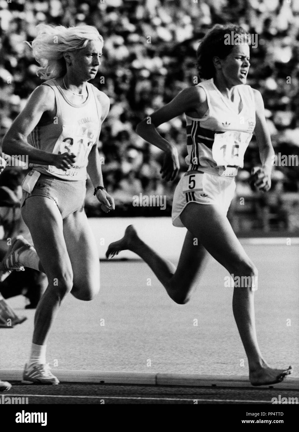 ZOLA BUDD track and field athlete born in South Africa compete for Great Britain in Olympics summer game Los Angeles 1984 leads the 3000m run before   Stock Photo