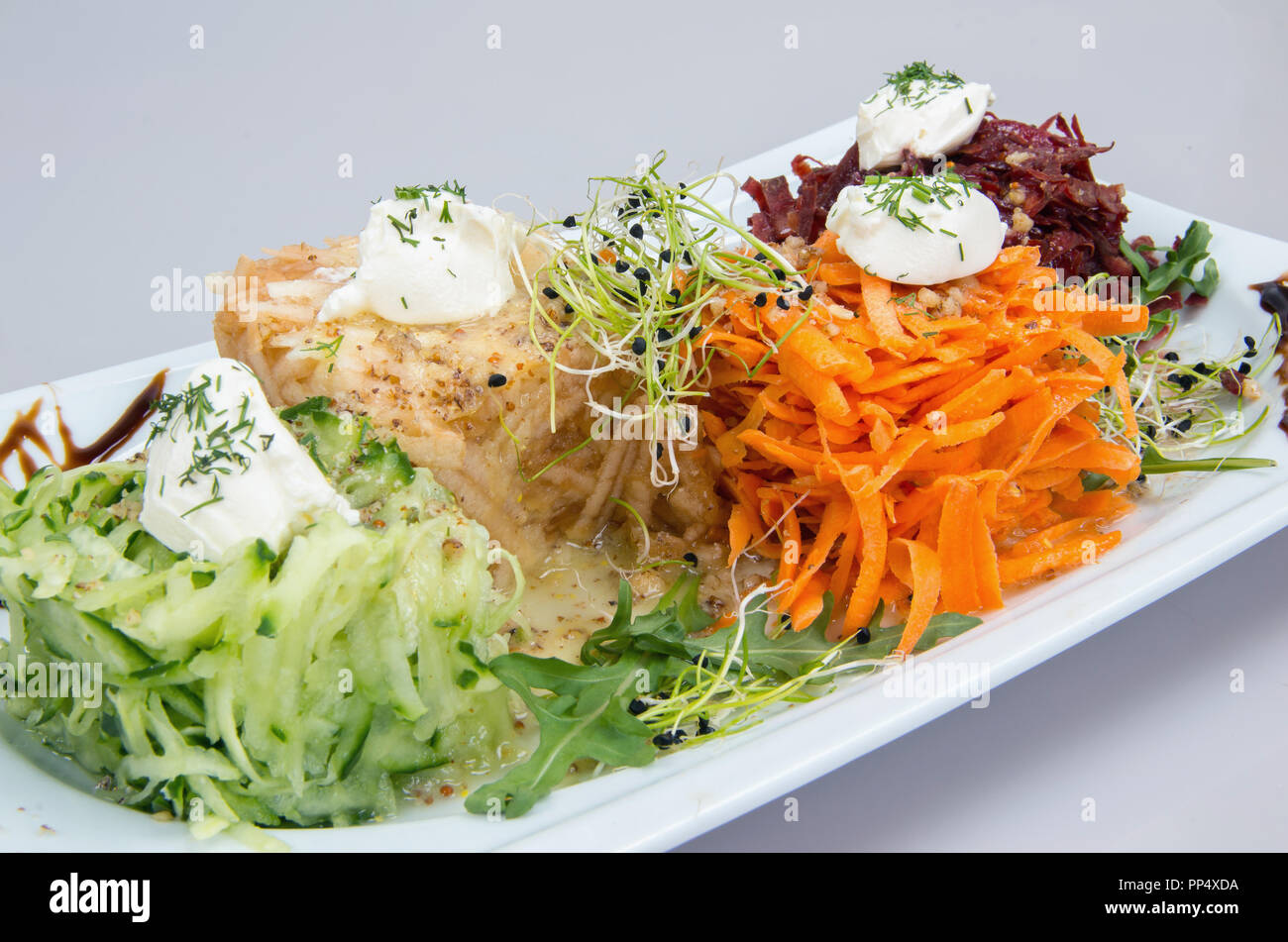 Salad with Feta sauce and Halumi cheese. Stock Photo