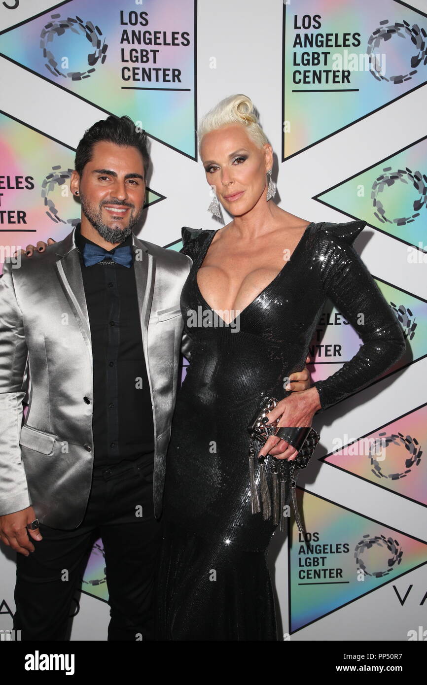 Beverly Hills, Ca. 22nd Sep, 2018. Mattia Dessi, Brigitte Nielsen, at the Los Angeles LGBT Center's 49th Anniversary Gala Vanguard Awards at the Beverly Hilton in Beverly Hills, California on September 22, 2018. Credit: Faye Sadou/Media Punch/Alamy Live News Stock Photo