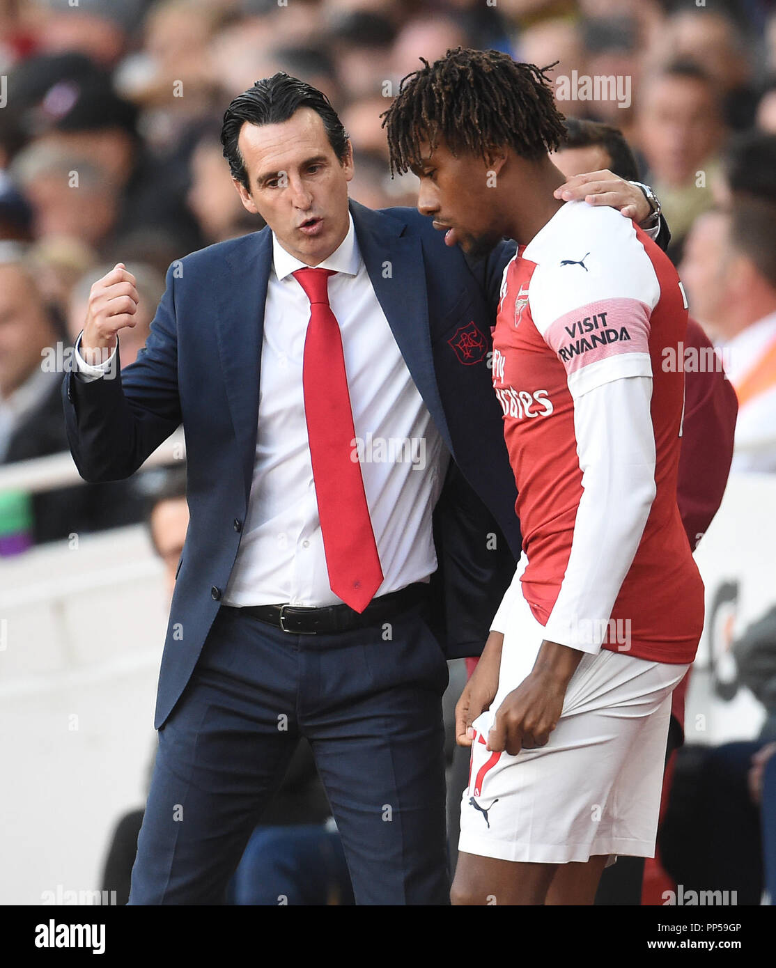 Alex Iwobi of Arsenal and manager Unai Emery in action during the Premier League match between Arsenal and Everton at Emirates Stadium on September 23rd 2018 in London, England. (Photo by Zed Jameson/phcimages.com) Stock Photo