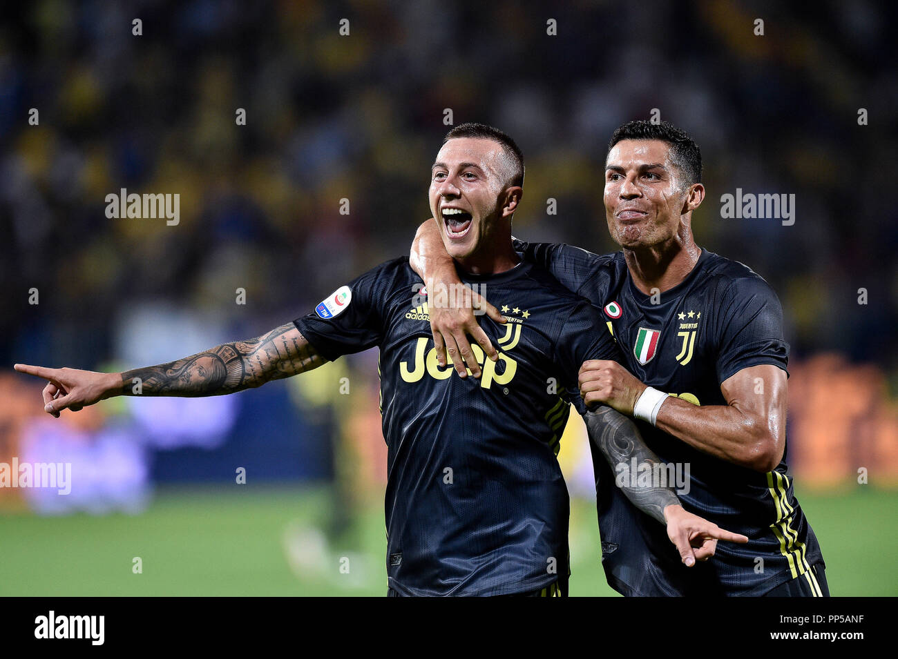 Turin, Italy - 26 June, 2020: Paulo Dybala (C) of Juventus FC celebrates  with Cristiano Ronaldo (R) and Federico Bernardeschi (L) of Juventus FC  after scoring a goal during the Serie A