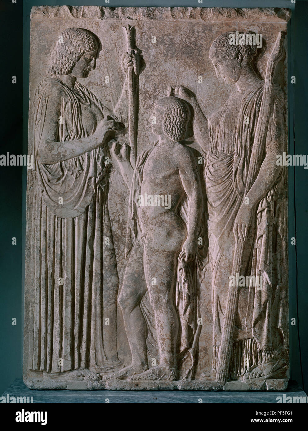 Greek art. Votive relief: the Eleusinian Mysteries. Demeter, Persephone and Triptolemus.. Athens, museum of archaeology. Location: MUSEO ARQUEOLOGICO-ESCULTURA. ATHENS. Stock Photo