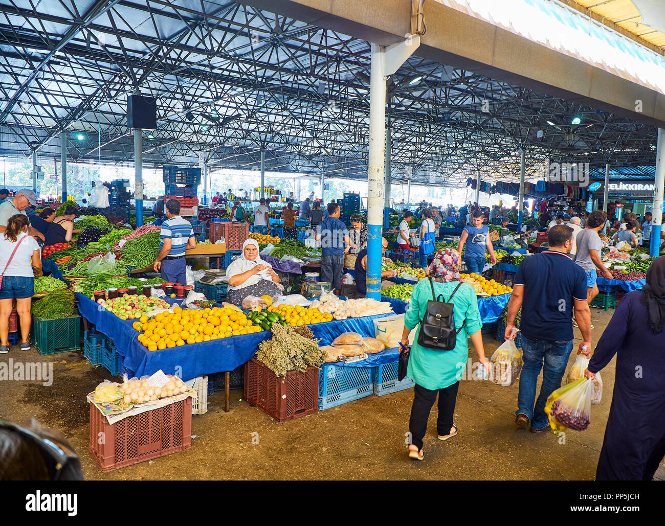 Bodrum, Turkey - July 6, 2018. Citizens shopping in Bodrum market, Kapalı Pazar Yeri, at downtown. Mugla Province, Turkey. Stock Photo