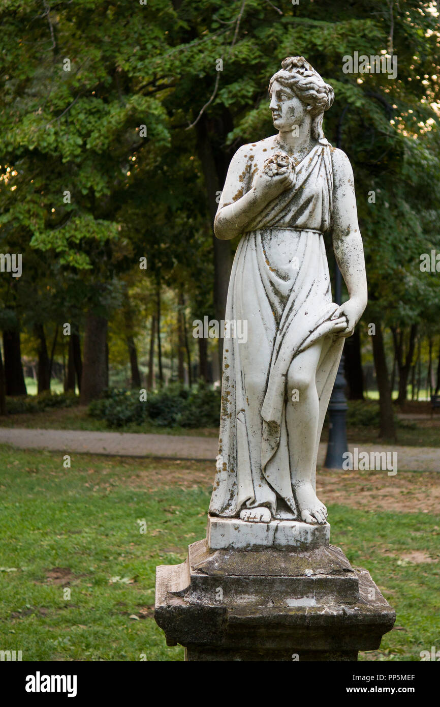Muse statue with time patina in Nicolae Romanescu Park, Craiova, Romania. Stock Photo