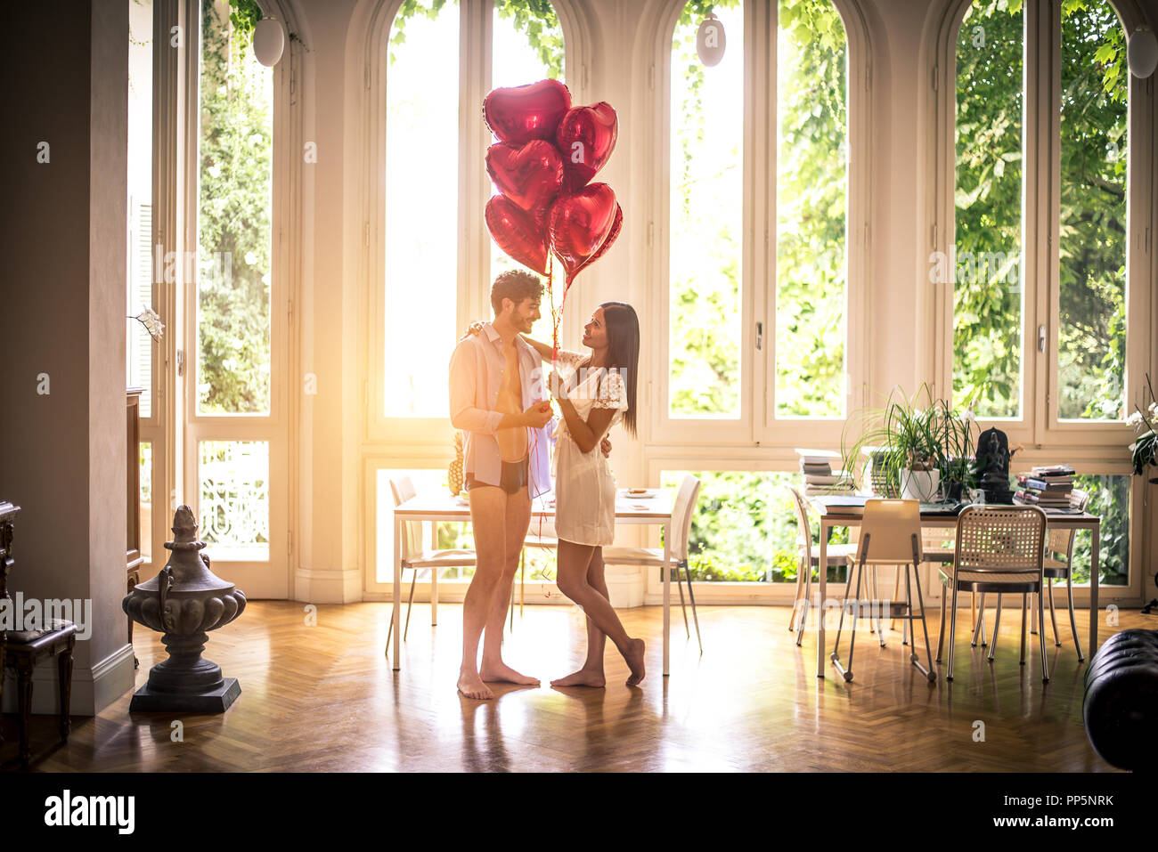 Romantic Moments At Home Boyfriend Presenting Heart Shaped