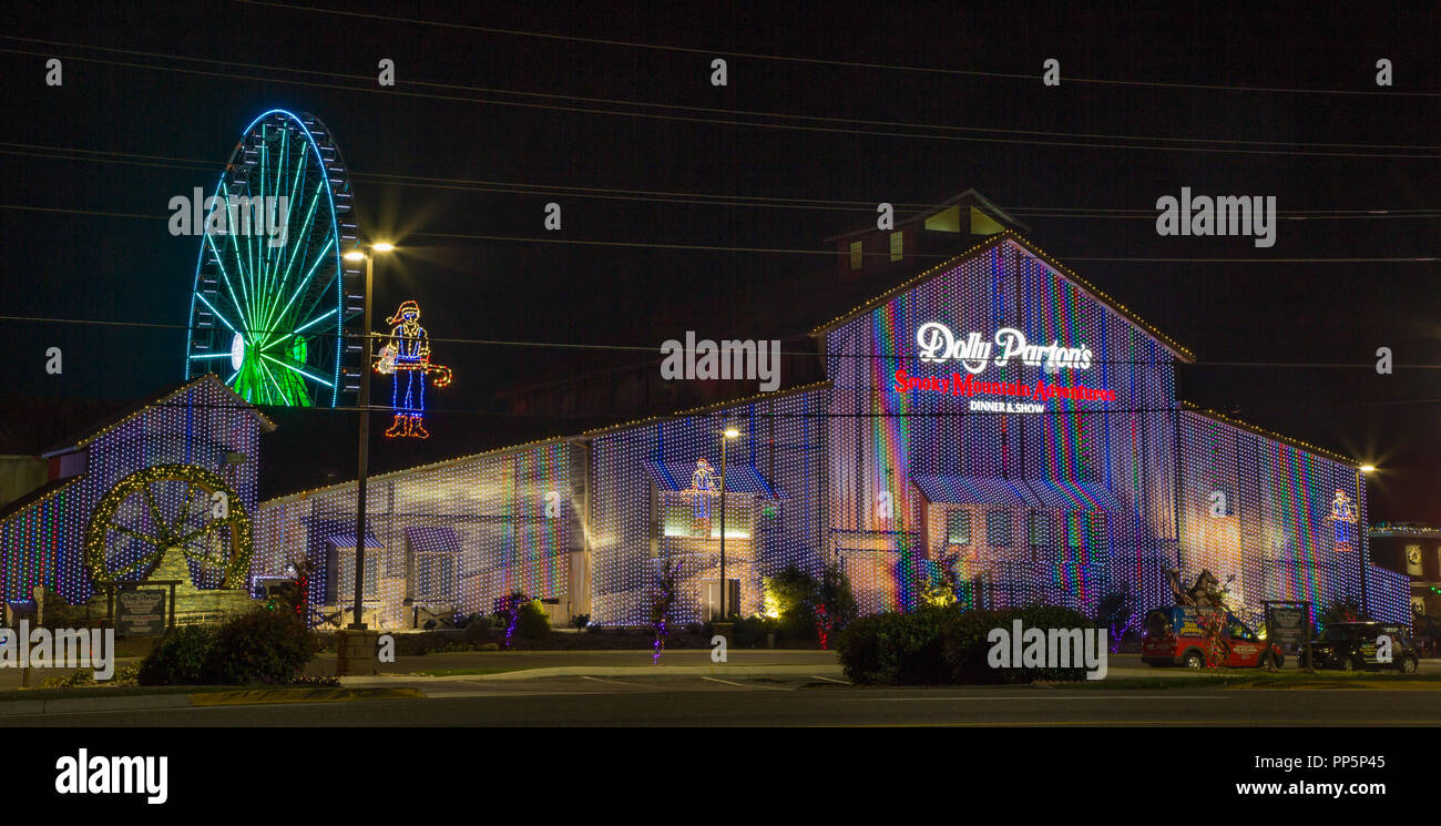 Dolly Partons Celebration Dinner and Show theater lit up at night in Pigeon Forge, Tennessee, USA Stock Photo