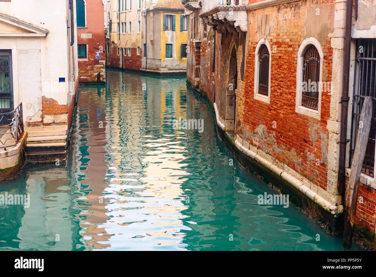 Colourful and relaxing canal in Venice Stock Photo - Alamy
