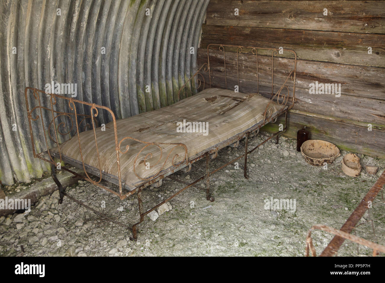 Resting place inside the trench used during the First World War in the Main de Massiges in Marne region in north-eastern France. The Main de Massiges was one of the major sites of the First World War from 1914 to 1918. The trench of German origin was conquered by the 23rd Colonial Infantry Regiment of the French Army on 25 September 1915 and was the first line of French defence from September to October 1915. The area is restored using the original artefacts found in the ground by the Main de Massiges Association since 2009. Stock Photo