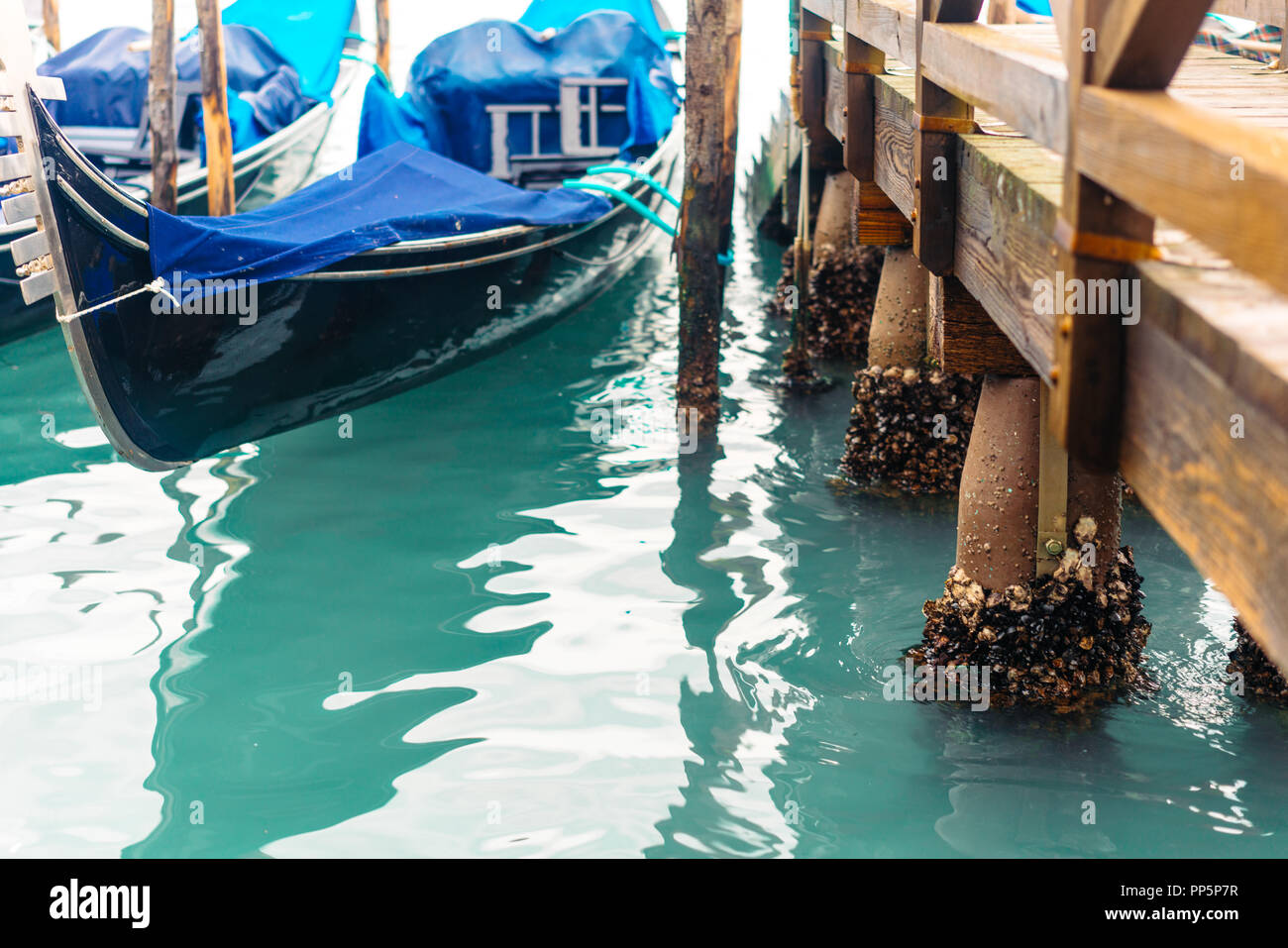 Rows of traditional wooden gondolas Stock Photo Alamy
