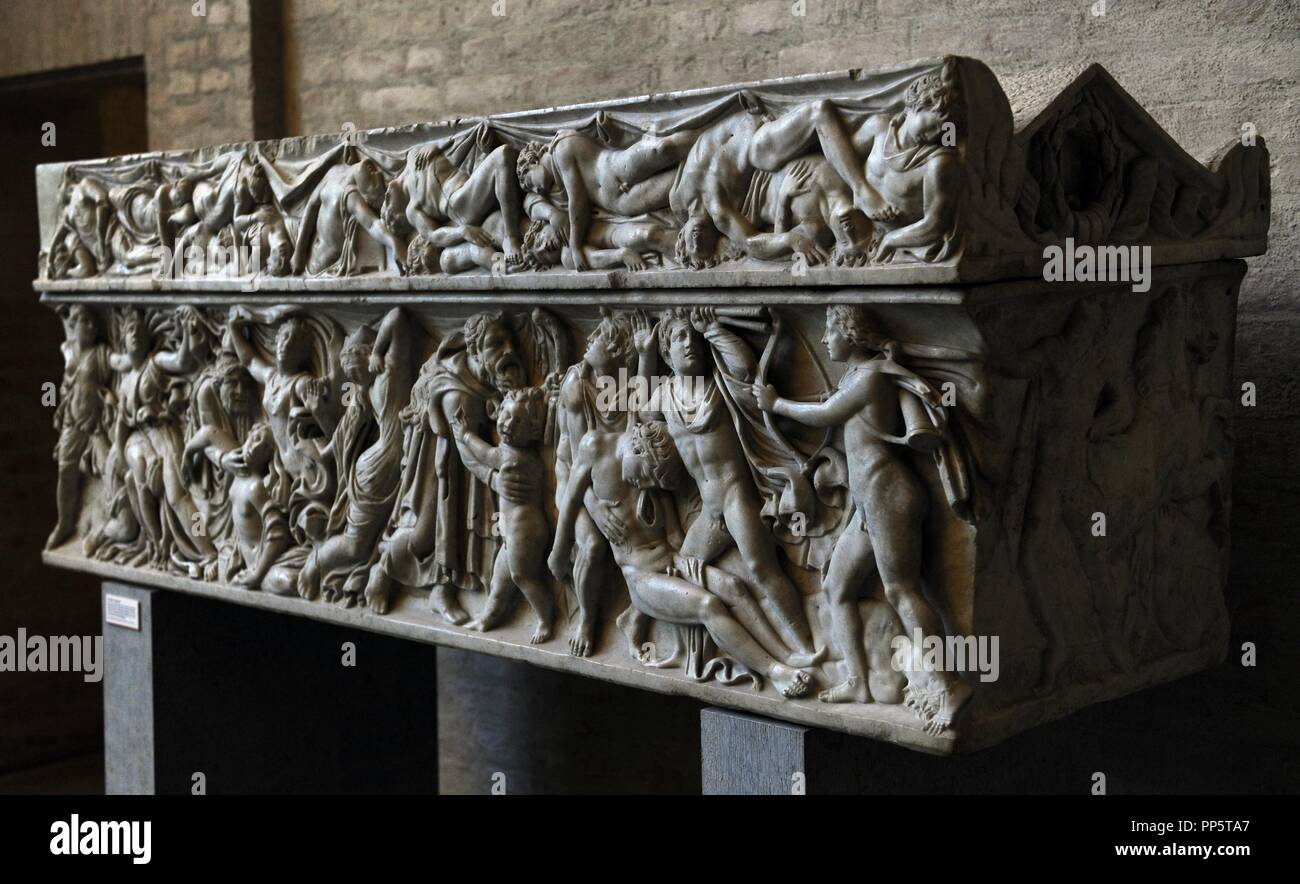 Roman sarcophagus. About 160 AD. Apollo and Artemis kill Niobe's 14 children. Revenge of Leto. Send your children Apollo and Artemis killing the children of Niobe. In the corner, a figure of Apollo with bow. Glyptothek. Munich. Germany. Stock Photo