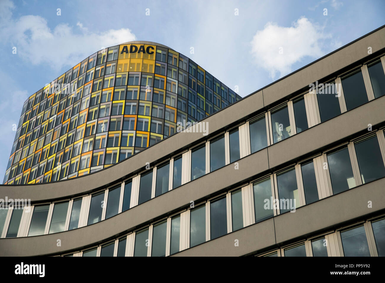 A logo sign outside of the headquarters of The ADAC (Allgemeiner Deutscher Automobil-Club) in Munich, Germany, on August 29, 2018. Stock Photo