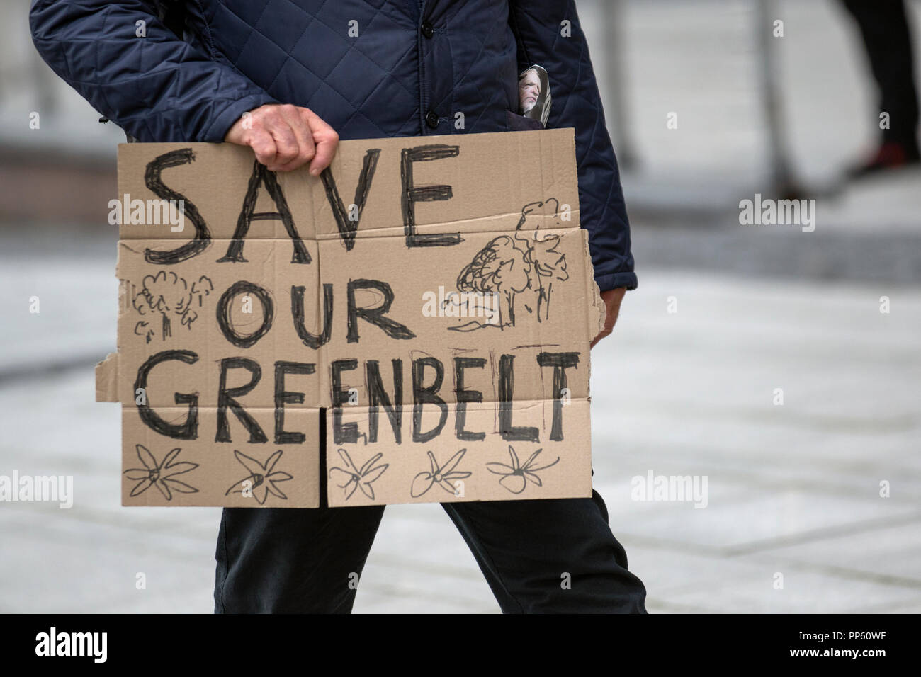 Save our greenbelt campaigner with cardboard sign at the Labour Party Conference, Liverpool, UK Stock Photo