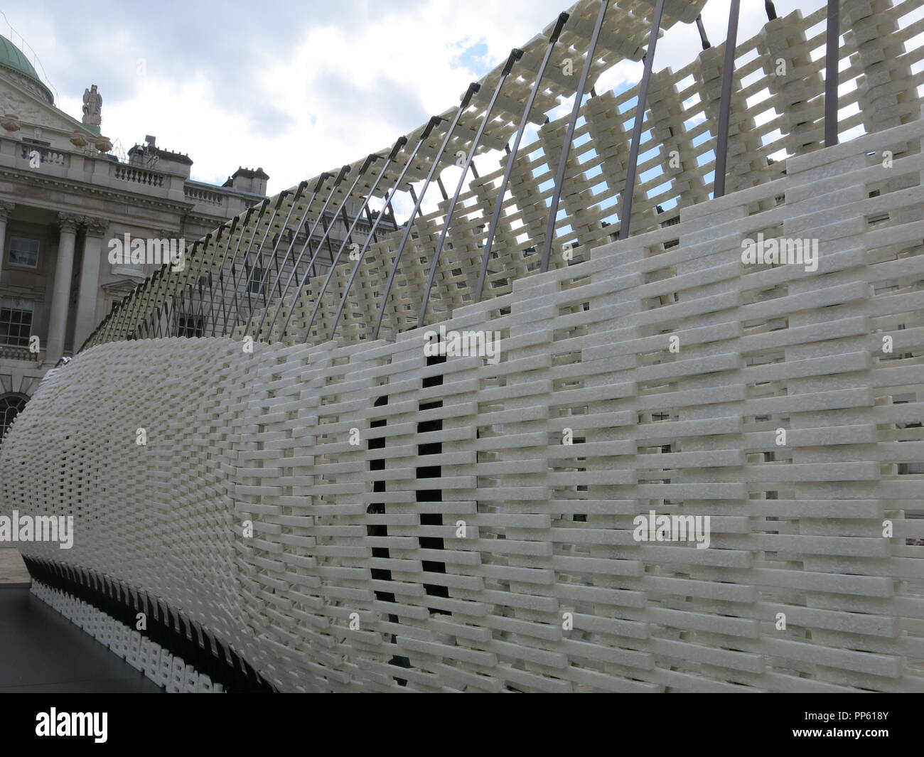 Greece's entry at the London Design Biennale 2018 is an outdoor installation; a 17m long kinetic wall that flexes and changes as you walk through it. Stock Photo