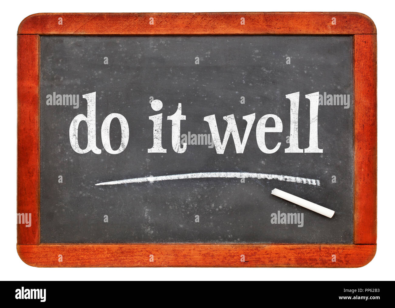 Do it well motivational note - white chalk text on a vintage slate blackboard Stock Photo