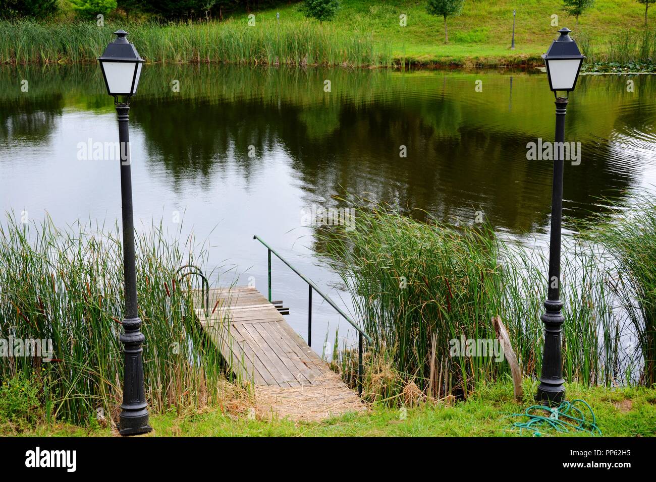 reflections in the lake and street lamps Stock Photo