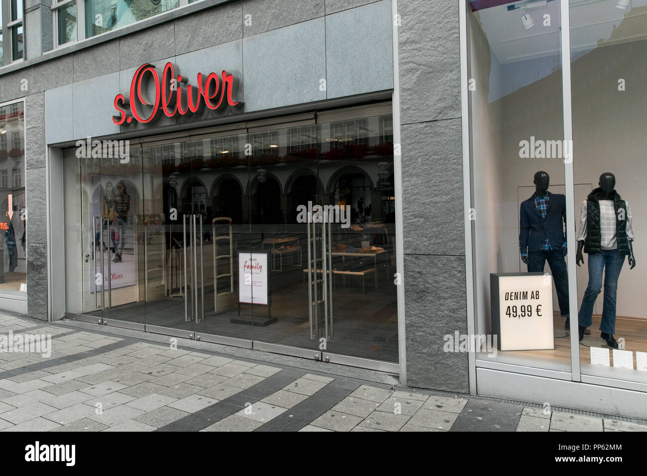 A logo sign outside of a s.Oliver retail store in Munich, Germany, on September 2, 2018. Stock Photo