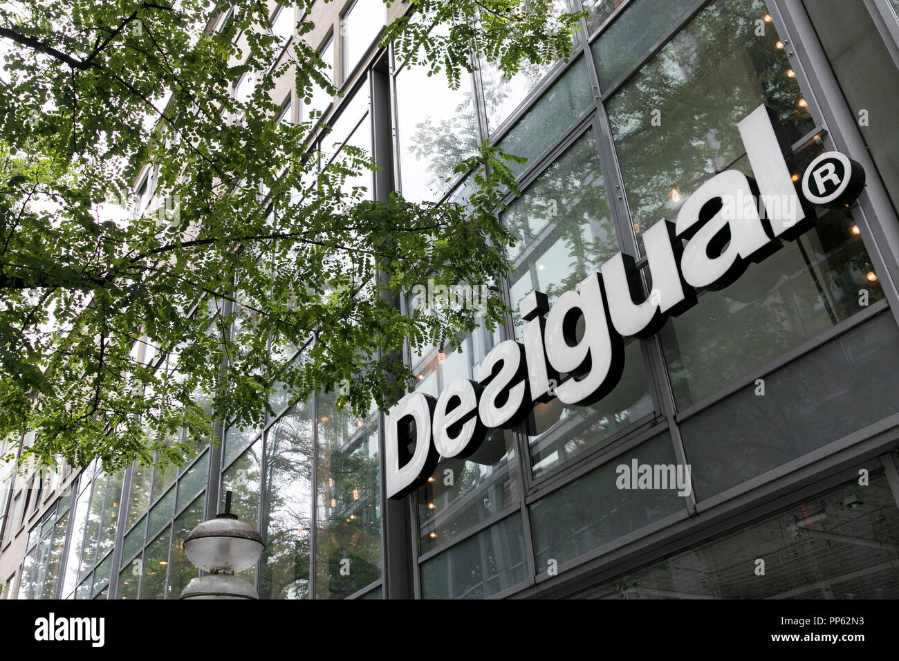 A logo sign outside of a Desigual retail store in Munich, Germany, on September 2, 2018. Stock Photo