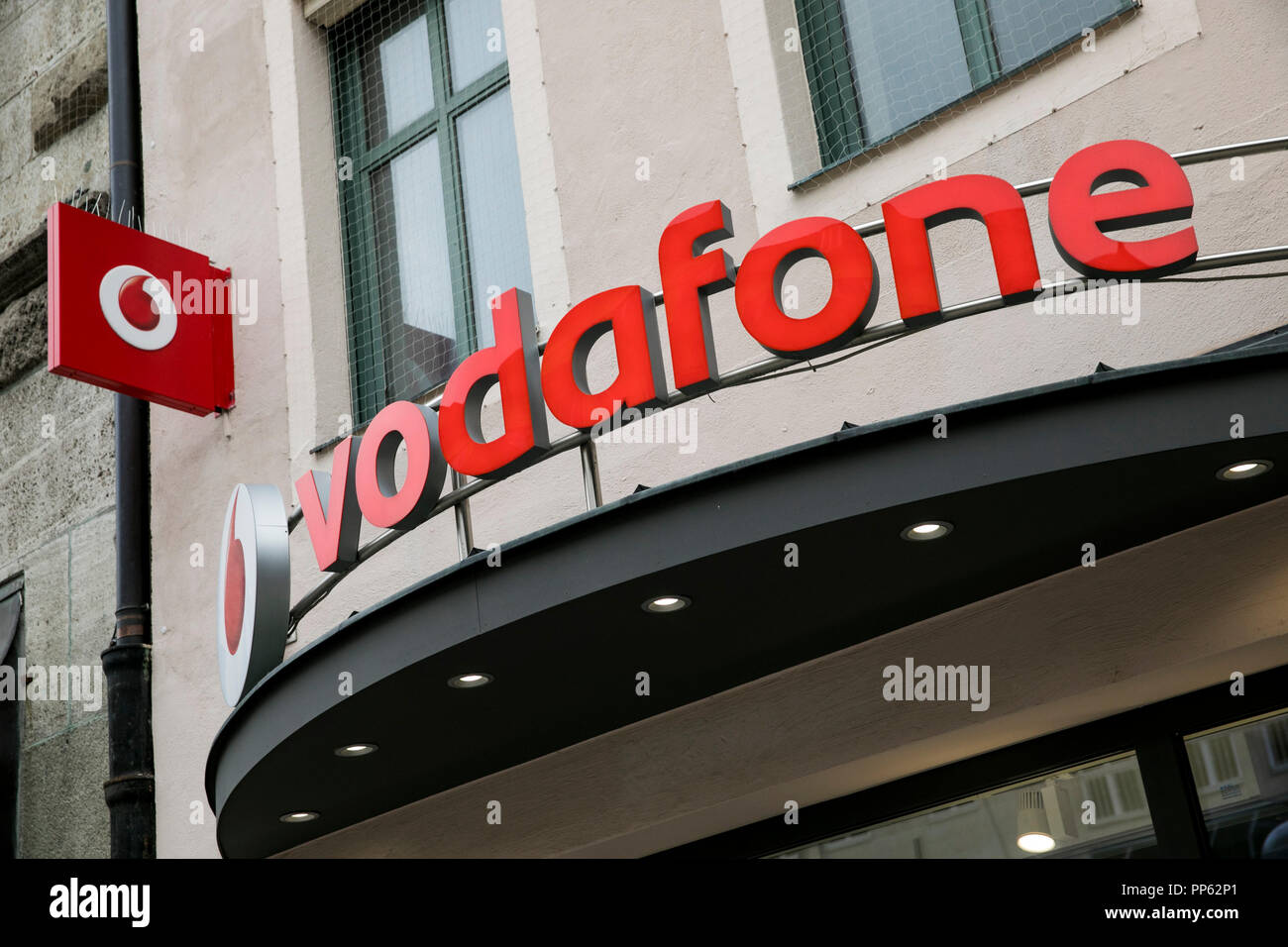 A logo sign outside of a Vodafone retail store in Munich, Germany, on September 2, 2018 Stock Photo - Alamy A logo sign outside of a Vodafone retail store in Munich, Germany, on September 2, 2018 Stock Photo - Alamy
