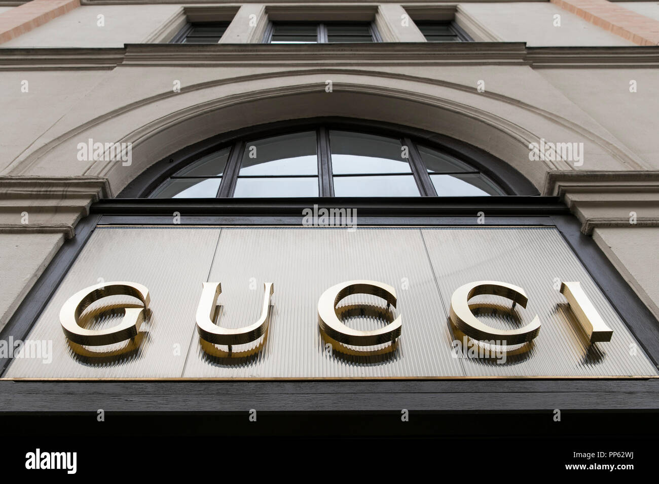 A logo sign outside of a Gucci retail store in Munich, Germany, on ...