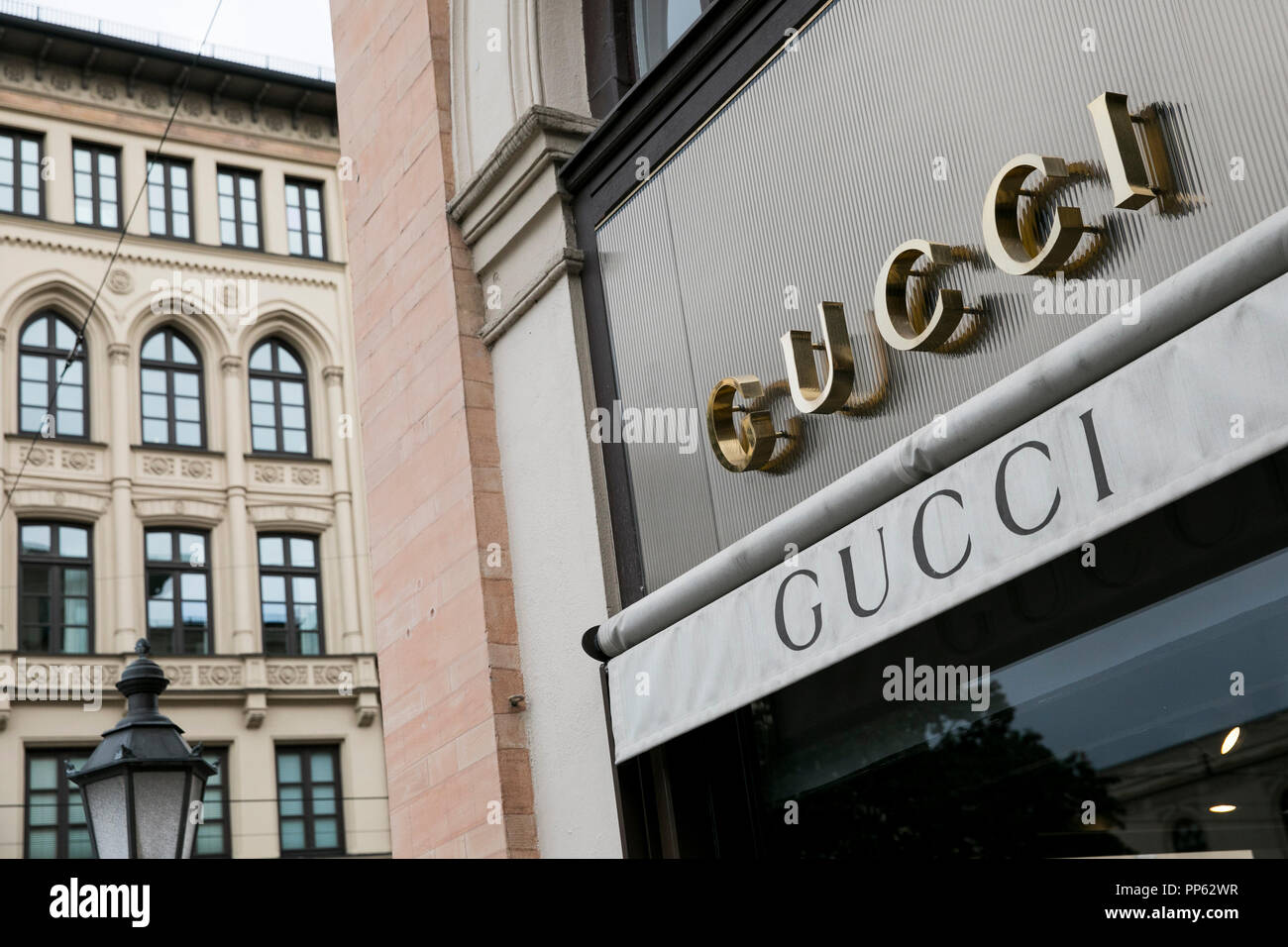 A logo sign outside of a Gucci retail store in Munich, Germany, on  September 2, 2018 Stock Photo - Alamy