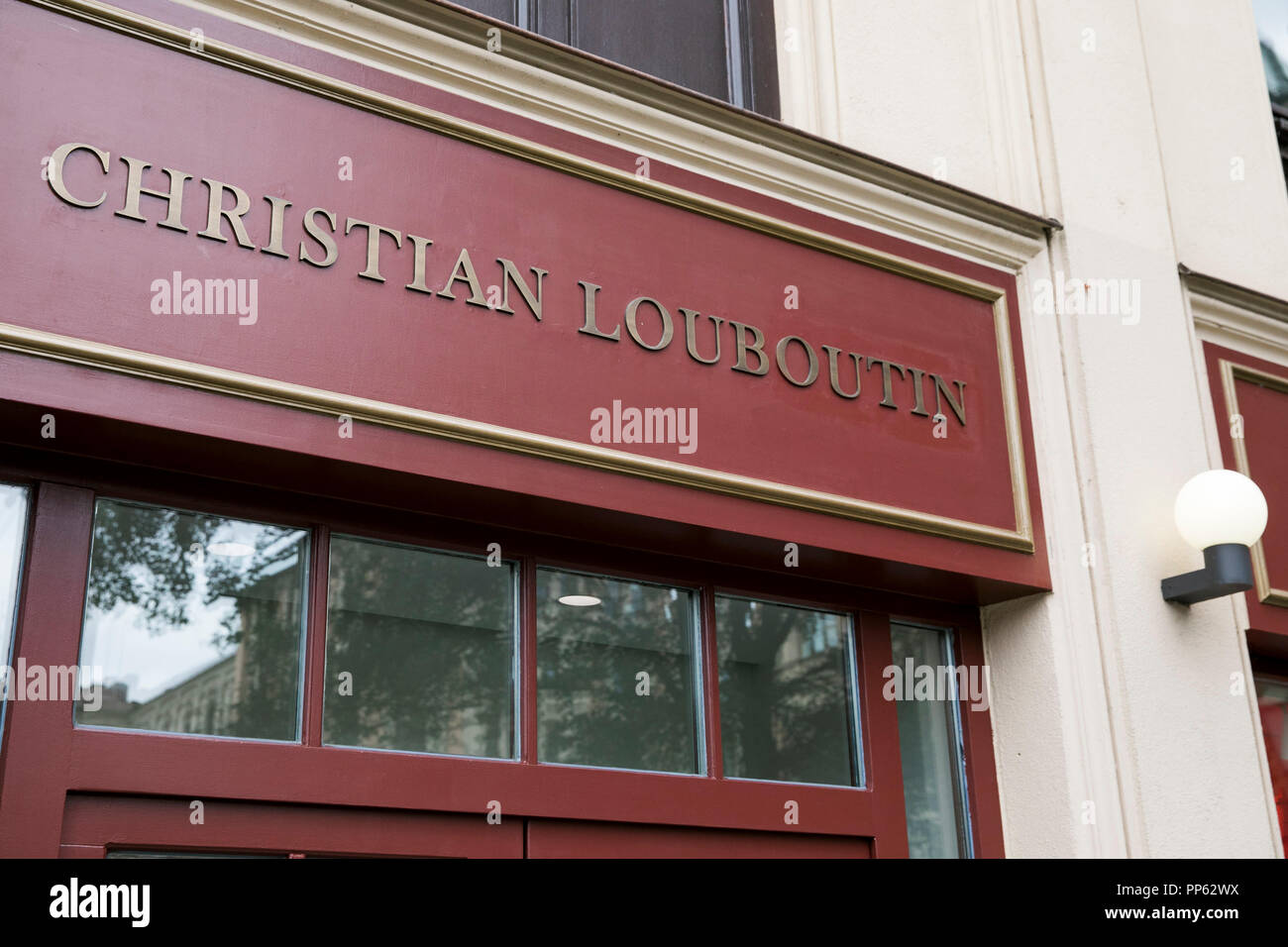 A logo sign outside of a Christian Louboutin retail store in Munich,  Germany, on September 2, 2018 Stock Photo - Alamy