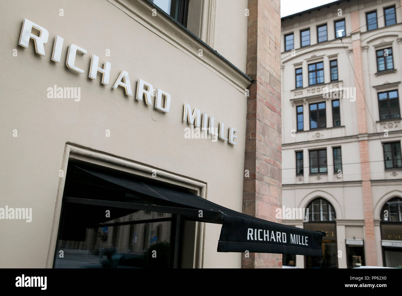 A logo sign outside of a Richard Mille retail store in Munich, Germany, on September 2, 2018. Stock Photo