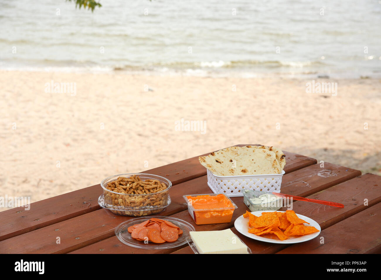 A delicious picnic table along the lake. Lake of the Woods, Kenora, Canada. Stock Photo