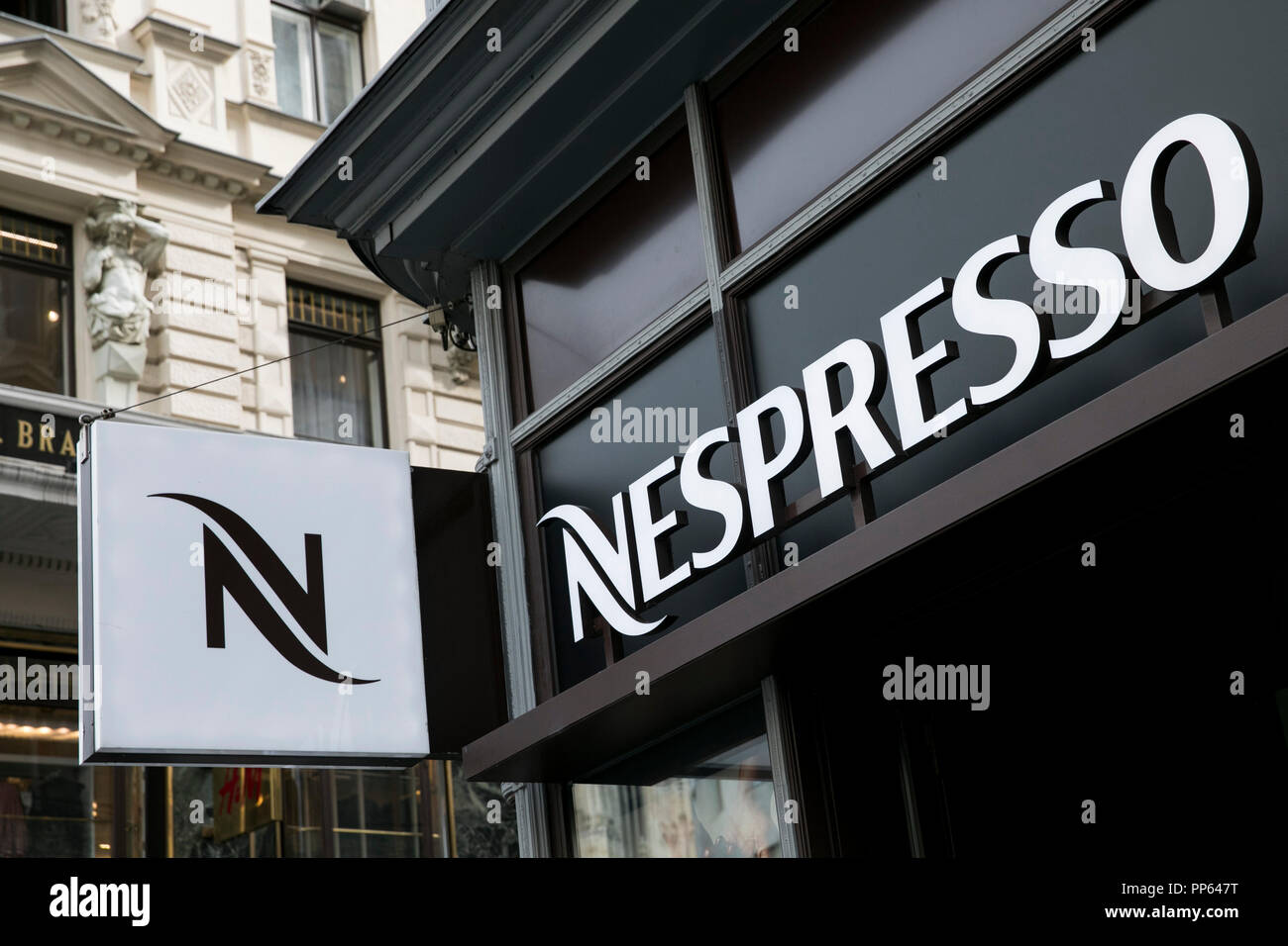 A logo sign outside of a Nespresso retail store in Vienna, Austria, on September 4, 2018. Stock Photo