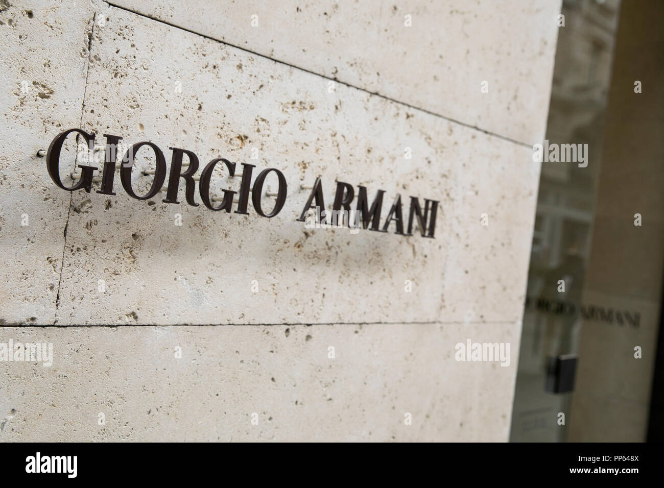 Armani sign hi-res stock photography and images - Alamy