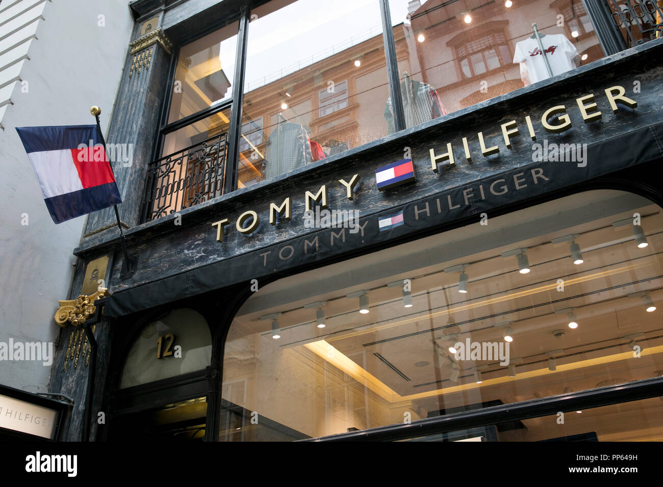 A logo sign outside of a Tommy Hilfiger retail store in Vienna, Austria, on  September 4, 2018 Stock Photo - Alamy