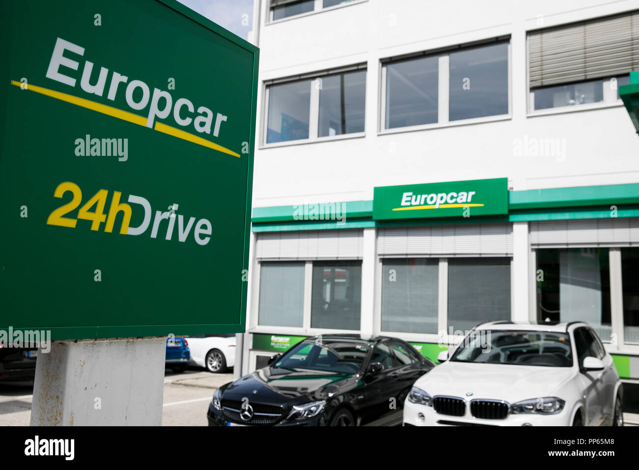 A logo sign outside of a Europcar Mobility Group car rental location in  Munich, Germany, on September 9, 2018 Stock Photo - Alamy