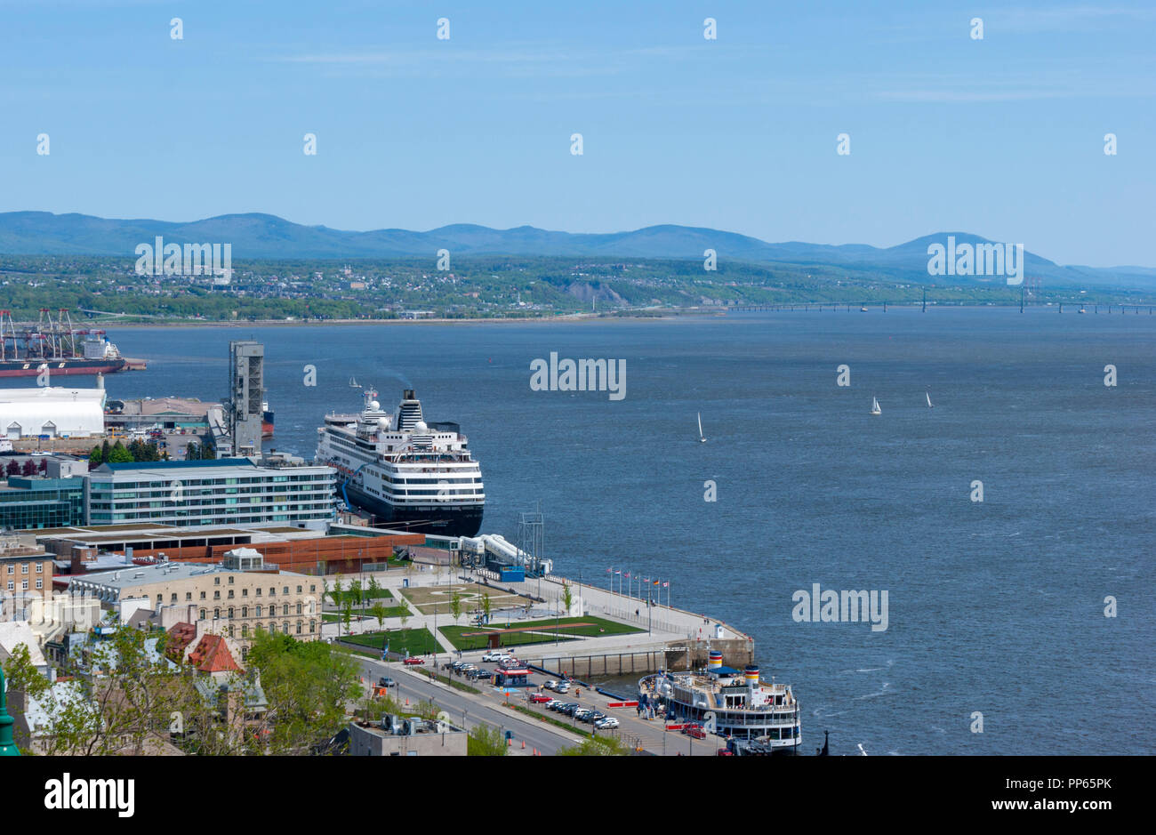 View of the Port of Quebec from the “Promenade des Gouverneurs”. A cruise ship is docked in the harbor. Québec City. Québec, Canada. Stock Photo