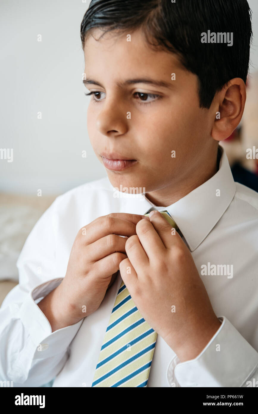 Boy getting dressed hires stock photography and images Alamy